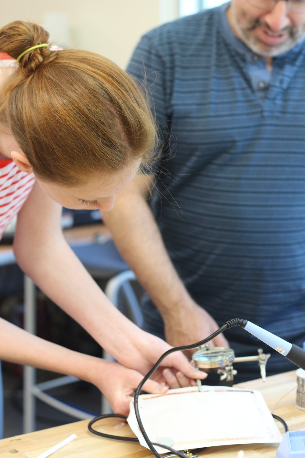 student soldering